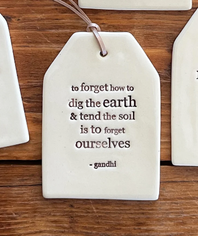 Paper Boat Press Quote Tag - To forget how to dig the earth....