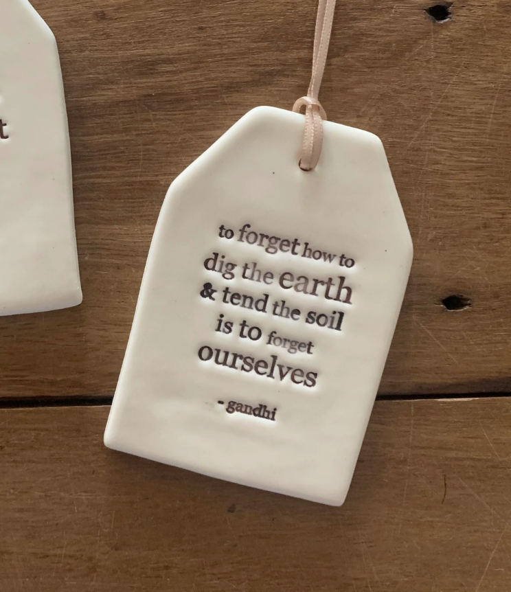 Paper Boat Press Quote Tag - To forget how to dig the earth....