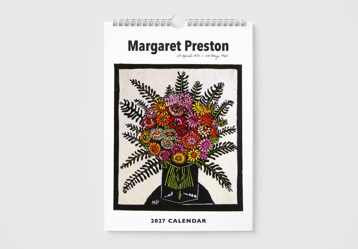 A hanging spiral-bound 2027 calendar titled 'Margaret Preston' on a light gray background. The cover features a black-and-white portrait illustration with a colorful bouquet of flowers in the center.