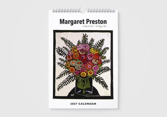 A hanging spiral-bound 2027 calendar titled 'Margaret Preston' on a light gray background. The cover features a black-and-white portrait illustration with a colorful bouquet of flowers in the center.